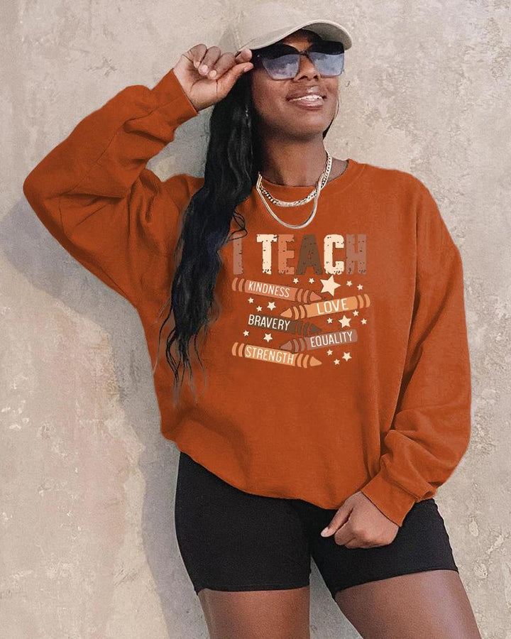 I Teach Melanin Long Sleeve Crewneck Sweatshirt