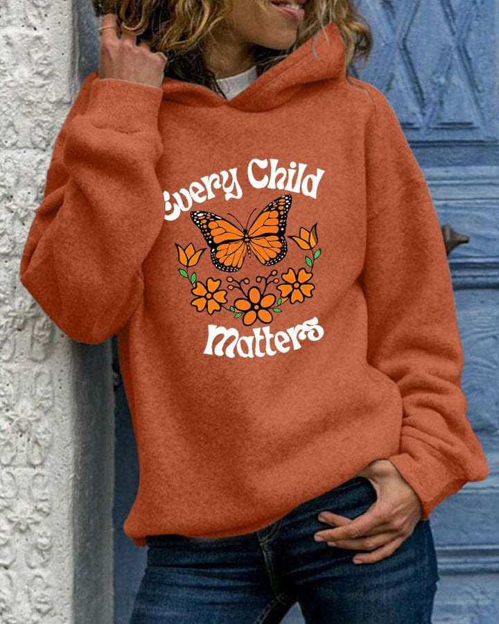 Women's Slogan  Every Child Matters With Pocket Long Sleeve Hoodie